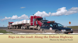 semi truck and subaru on dirt road
