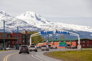 Sign Valdez Alaska above roadway