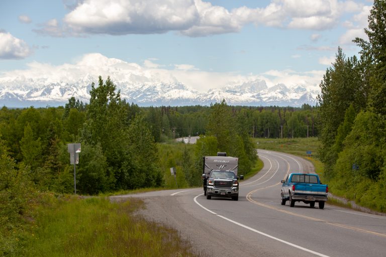 Photo of the Day: Talkeetna Spur Road Mile 13 Cars pass on Talkeetna Spur Road with Denali in the background