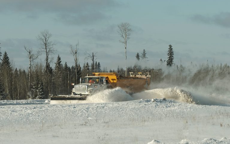 When do Alaska’s Highways Reopen snowplow clearing snow from a winter road